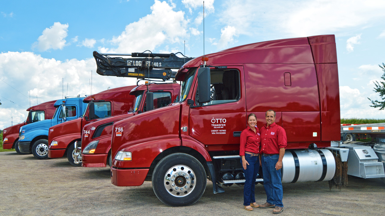 Kevin-and-Liz-with-trucks.jpg